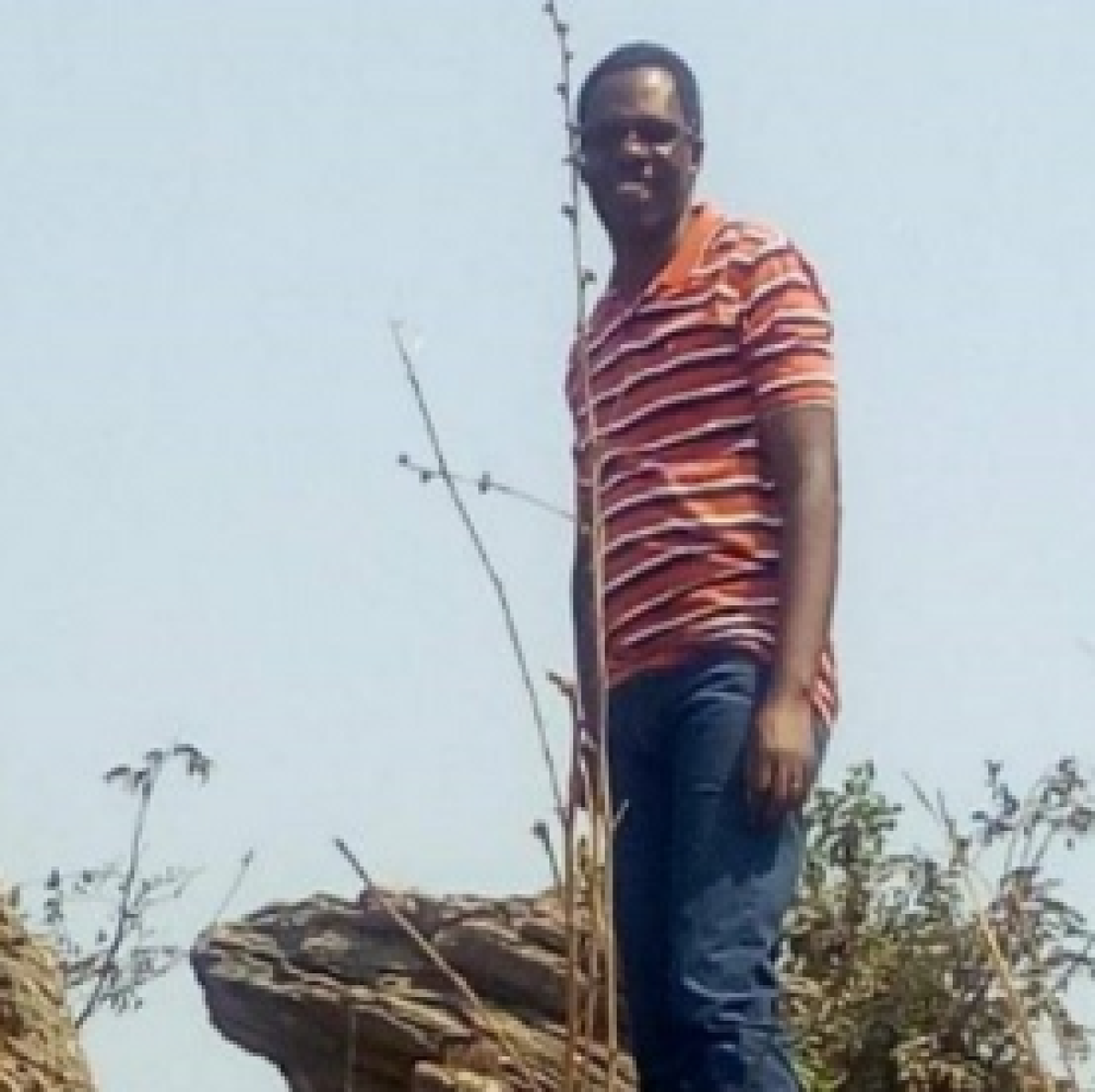 young man smiling at camera