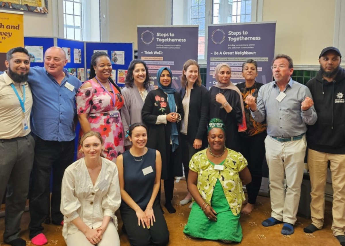 community group of people smiling at event