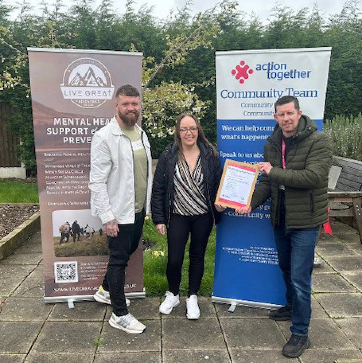 Live Great Adventures CIC - three people receiving a certificate